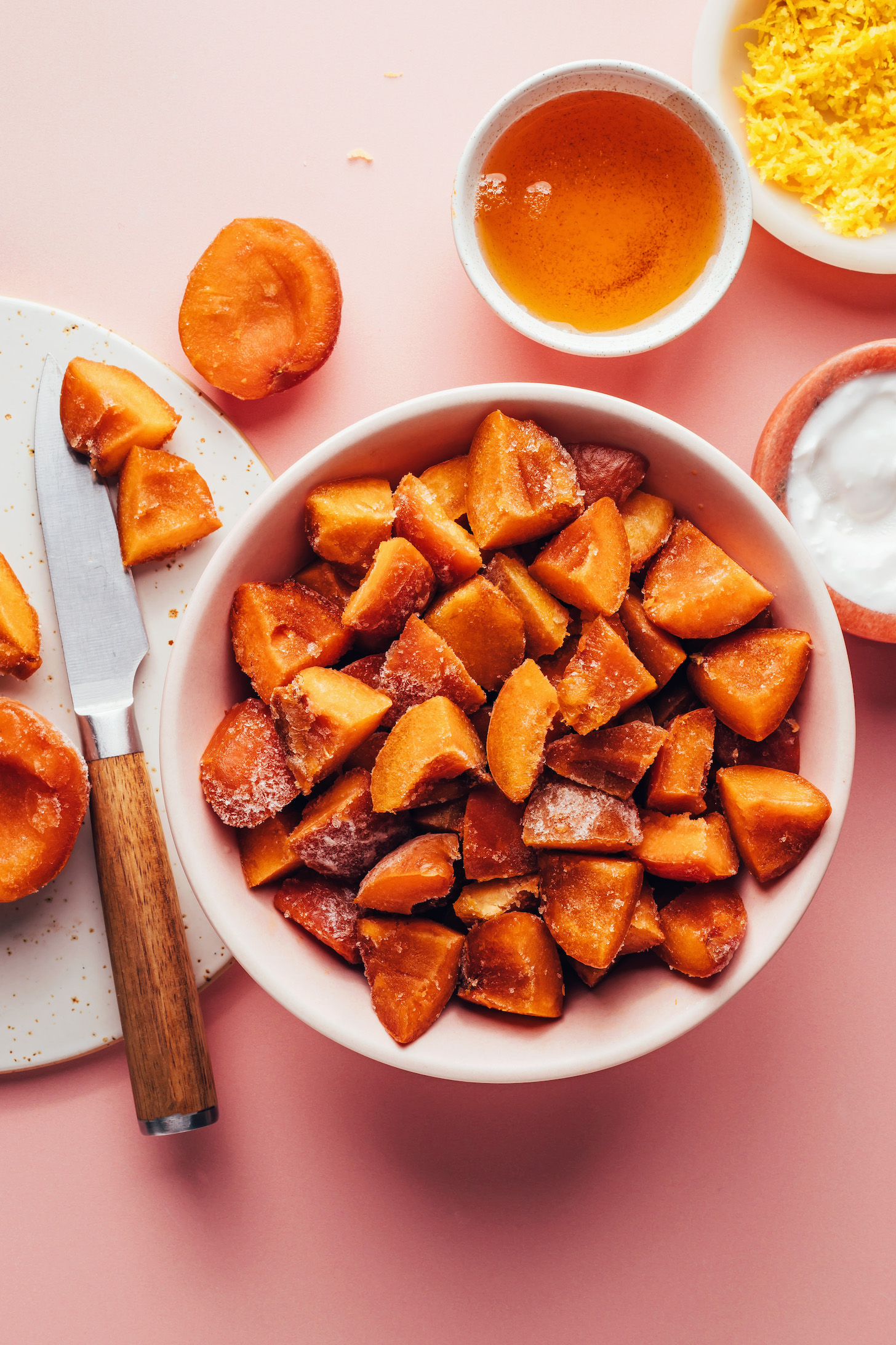 Chopped frozen apricots, agave, lemon zest, and coconut cream