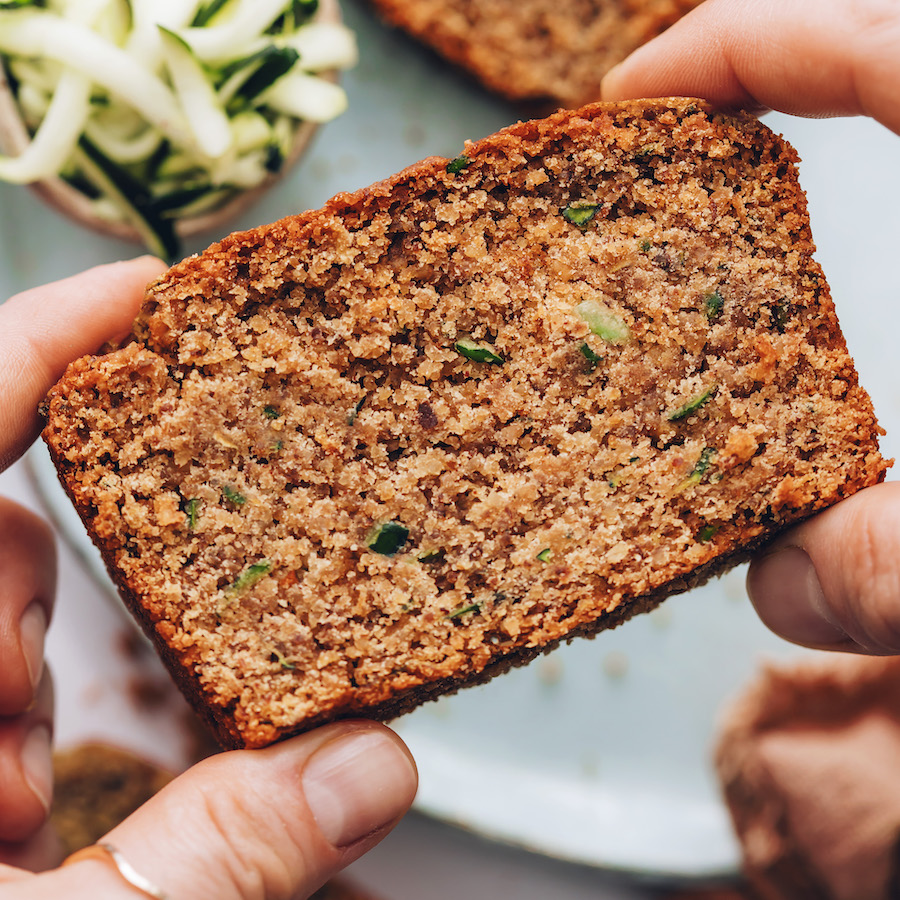 Slices of fluffy vegan gluten-free zucchini bread