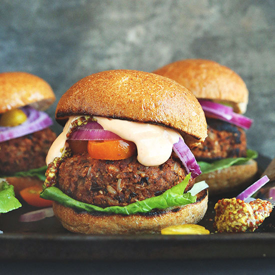 Tray filled with Easy Grillable Veggie Burgers on buns