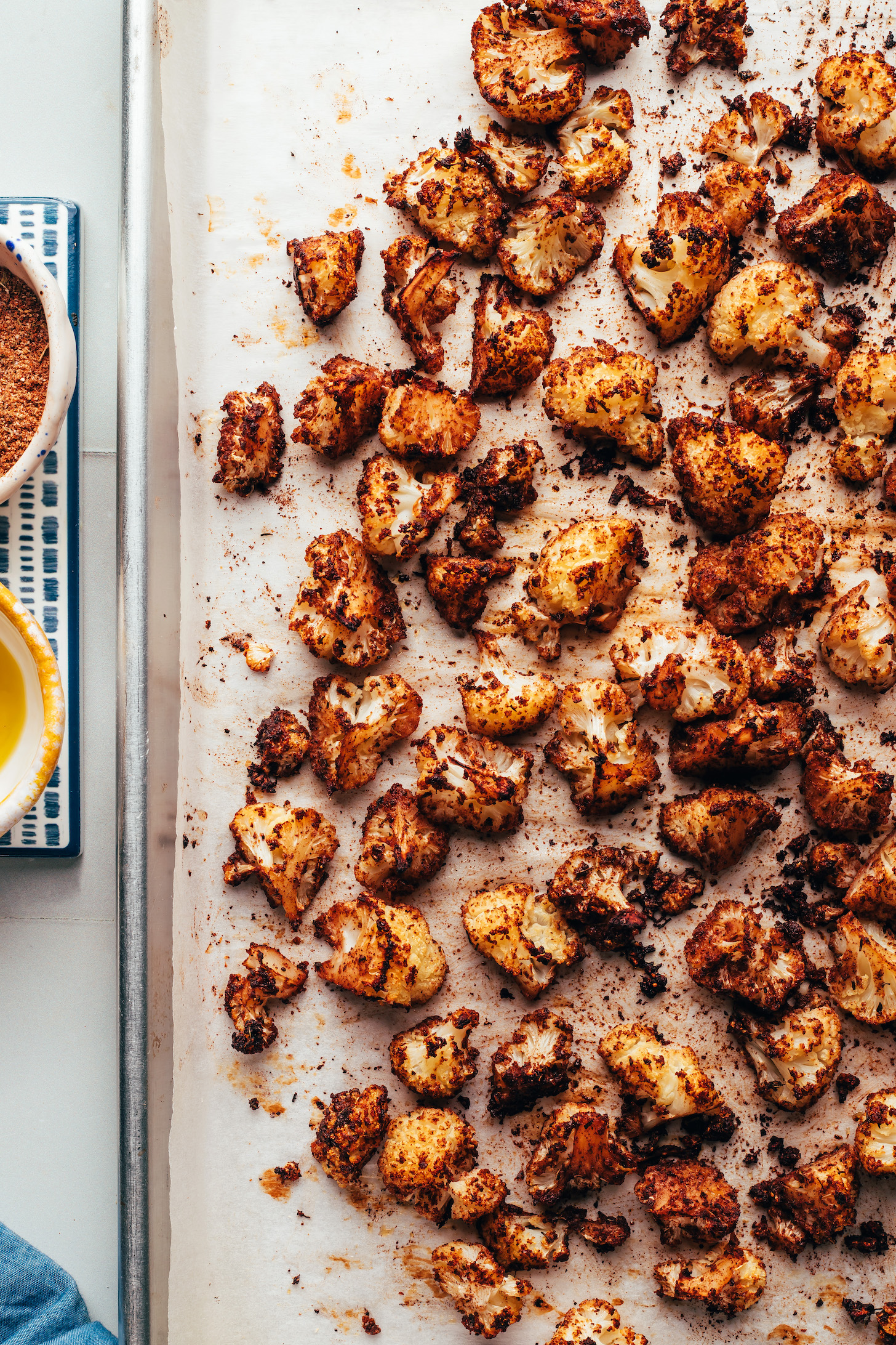 Roasted jerk cauliflower on a baking sheet