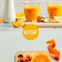 Glasses of our Lemon Ginger Turmeric Wellness Shots and ingredients to make them