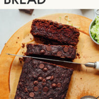 Overhead shot of a partially sliced loaf of chocolate zucchini bread