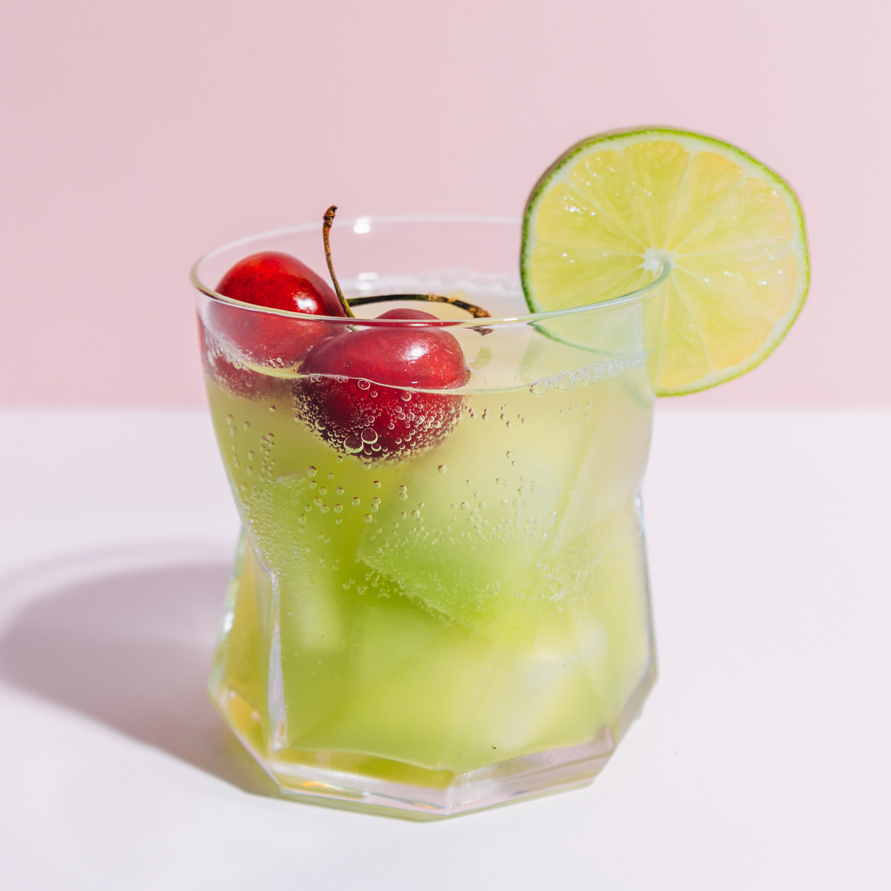 Close up shot of a glass of our Citrus and Melon Spritzer recipe