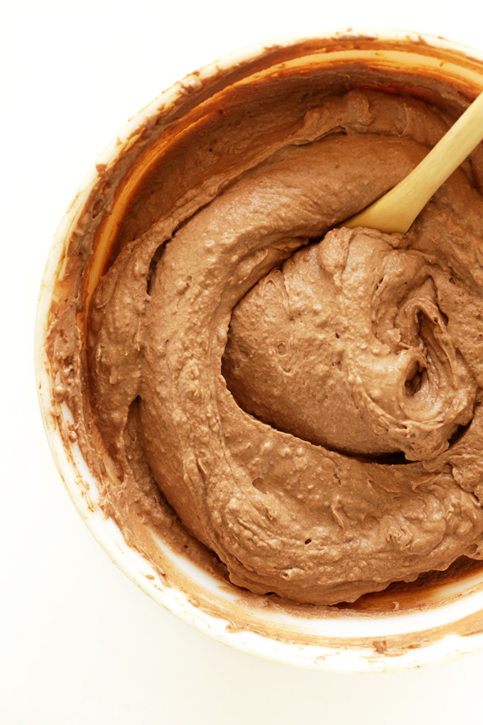 Using a spoon to stir our No-Churn Vegan Chocolate Ice Cream