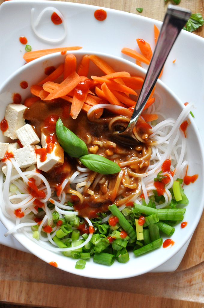 Colorful bowl of our Rice Noodle Bowl recipe with homemade Peanut Dressing