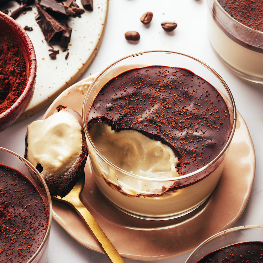 Dessert cup and spoonful of our vegan tiramisu pudding recipe